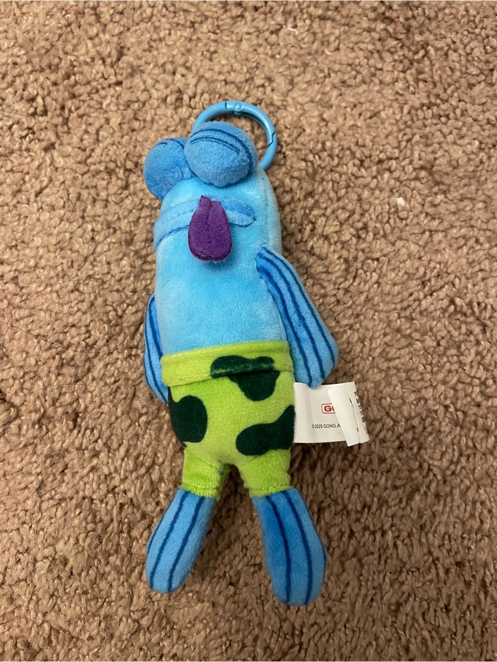 Blue Plush Character Keychain Toy with Green Shorts - Kids Accessory
